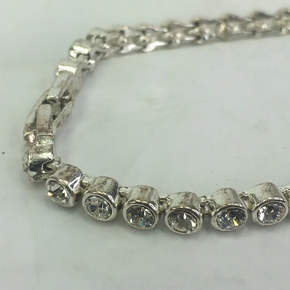 Cubic zirconia tennis bracelet silver tone 7.25” long - Picture 7 of 8